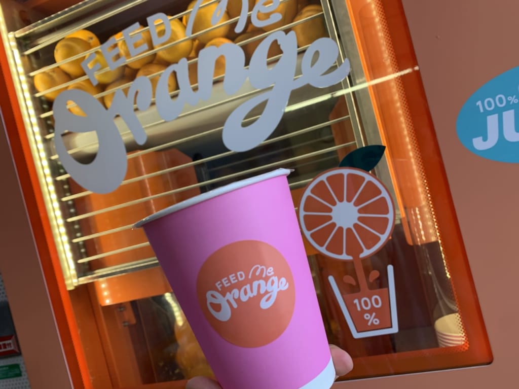 feedmeorangeオレンジジュース自動販売機